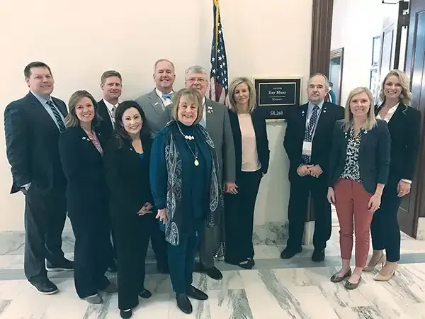 Dr. Copeland with a group of dental professionals at a senators office